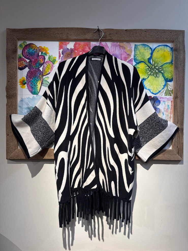 Poncho maglia frange bianco e nero