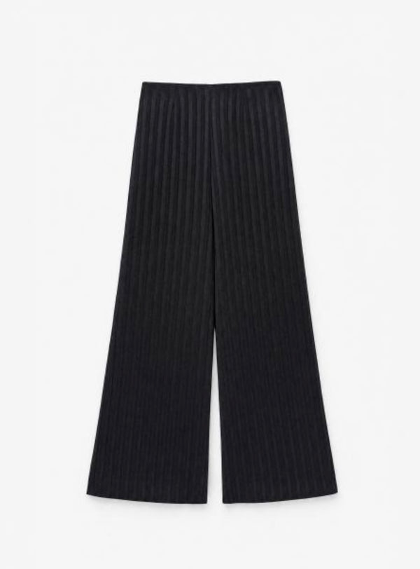 Pantalone palazzo nero a righe tono su tono