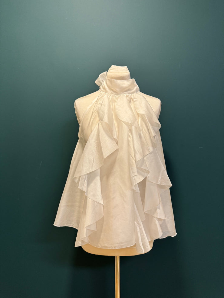 Top bianco con volant