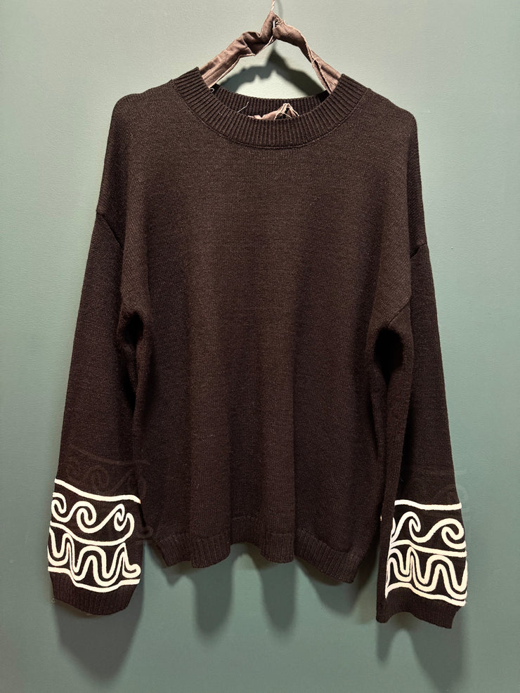 Maglia tuta nera con ricamo bianco