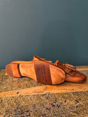 Mocassino con nappine e frange pitone