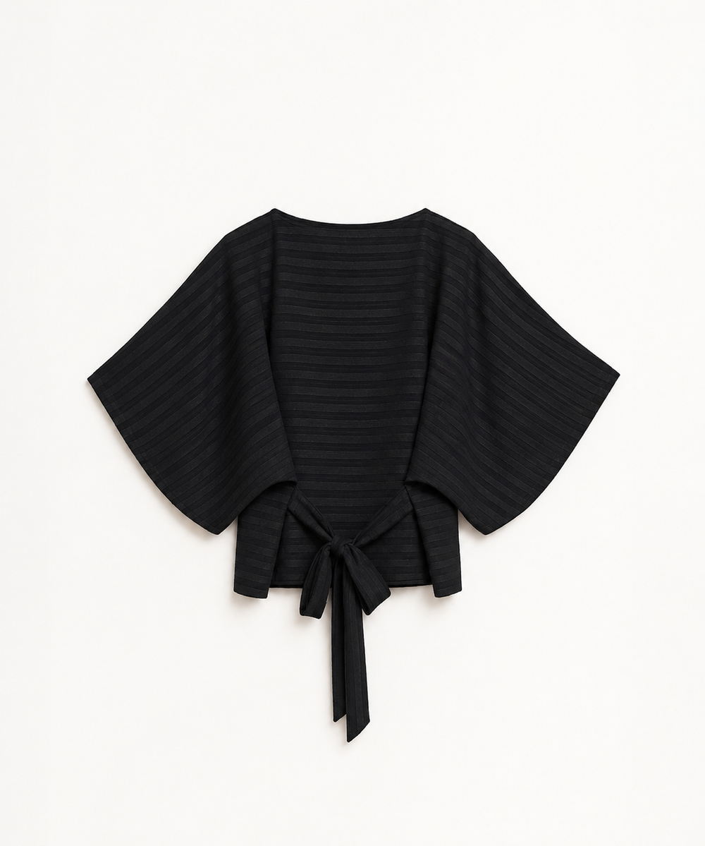 Blusa over a righe nera con fiocco sul retro